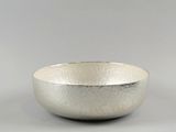 silver bowl on a white background with a gray background