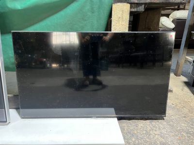 a television that is sitting on a table in a room