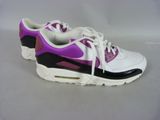 purple and white nike air max sneakers on a white surface