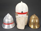 three different types of helmets are shown on a gray surface