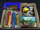 a box with a bunch of toy vehicles in it
