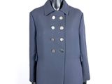 an image of a mannequin wearing a blue coat