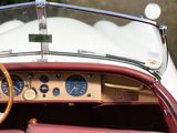 a close up of a steering wheel and dashboard of a car