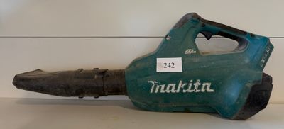 a green corded blower sitting on a counter