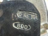 a close up of a metal object on a table