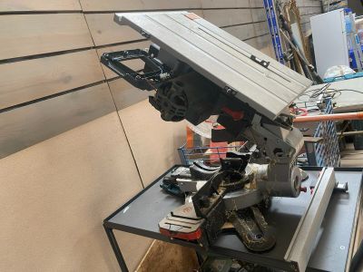a picture of a table with a saw on it