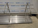 an image of a stainless steel sink with two sinks underneath it