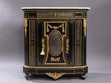 a black and gold painted cabinet with a marble top