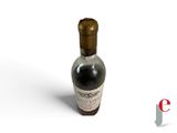 a bottle of wine that is sitting on a table