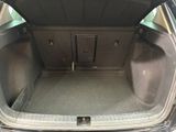 a trunk of a car with the back door open