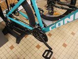a bike that is sitting on a stand in a room