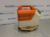 an orange and white machine sitting on top of a table