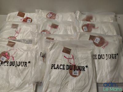 several bags of white t - shirts with the words place du jour written on them