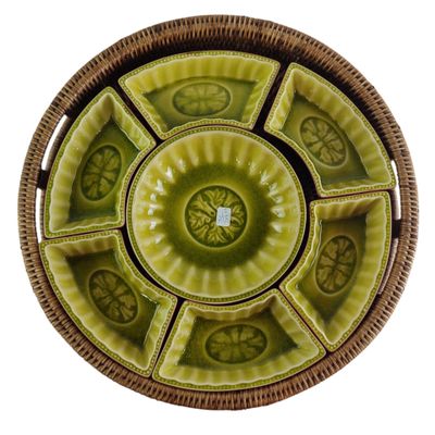 a green plate with a circular design on it