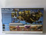 a close up of a box of toys on a white surface