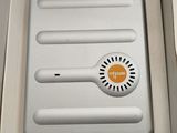a box with four batteries inside of it on a table