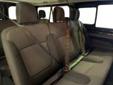 a seat belt in the back of a vehicle