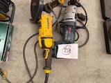 a lot of tools that are laying out on the floor