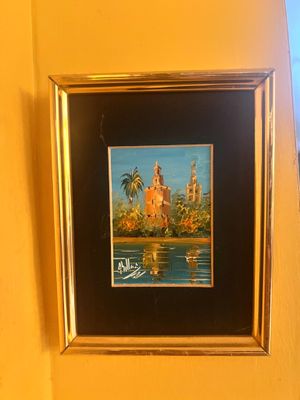 une photo d'un tableau accroché au mur