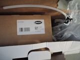 a box with a hose attached to it and a plastic bag on top