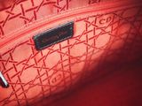 an image of a close up of a red handbag