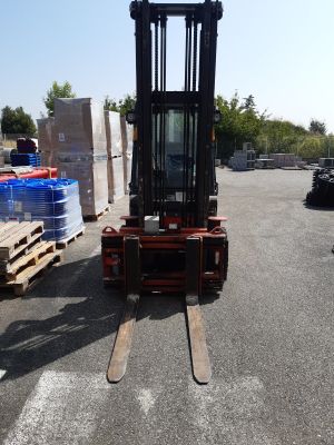 a forklift that is parked in a parking lot