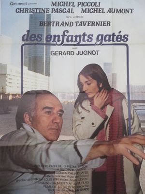 a movie poster of a man and a woman in a city