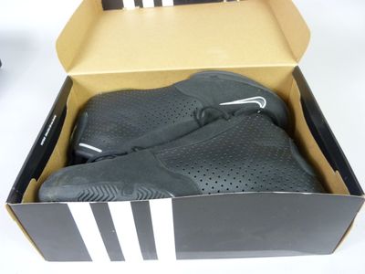 a box with a pair of shoes inside of it