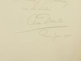 an old photo of a person ' s handwritten signature on a piece of paper