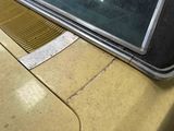 a close up of a car ' s windshield with a sticker on it