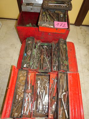 a red box with many tools inside of it