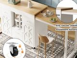 an image of a kitchen with a table and chairs