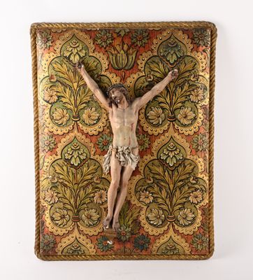 an old crucifix with a gold cloth covering it