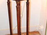 a small table with a lamp on top of it