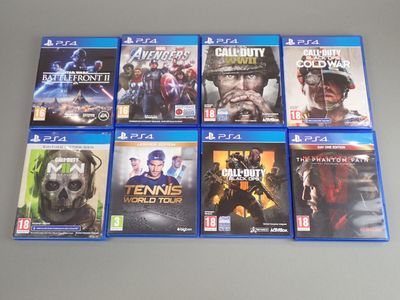 a lot of video game covers on the table