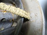 a close up of a piece of rope on a metal object