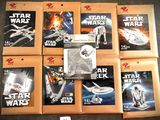 six livres « Star Wars » et une figurine Lego représentant un chasseur stellaire
