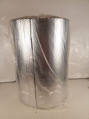 a roll of foil wrapped in plastic on a counter
