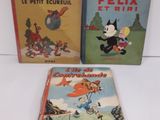 trois livres pour enfants sont posés sur une table les uns à côté des autres