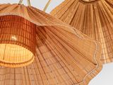 two lamps that are made out of bamboo sticks
