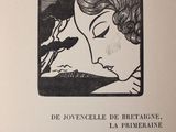an old book with a black and white drawing of a woman and a bird