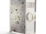 a glass display case with a clock inside of it