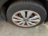 a close up of a tire on a car ' s rim