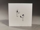 a white box with a pair of airpods on it