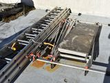 a picture of a large metal structure on a concrete floor