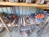 a lot of tools that are sitting on a shelf