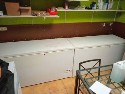 an image of a kitchen with a washer and dryer in it