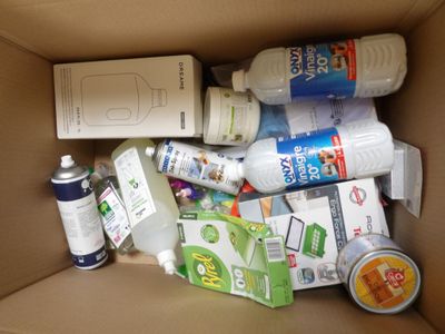 a cardboard box with a lot of items inside of it