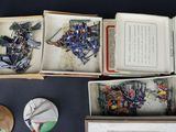 several boxes of assorted items are sitting on a table