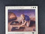 a card with a picture of a woman kneeling on the ground